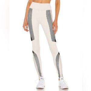 Alo Yoga Electric Leggings Bone white color with black detailing